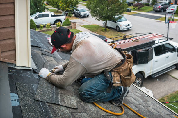 Professional Roofing technician working in Stowell, TX